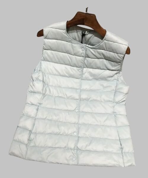 White Women's Lightweight Packable Puffer Vest - Front View, Women Sleeveless Puffer Vest, Close-Up of Premium White Duck Down Filling in Puffer Vest, Ultra-Lightweight Puffer Vest Folded Inside Travel Pouch