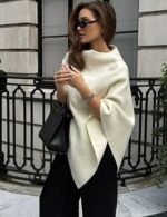woman sleeveless poncho