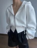 cropped white hoodie with high-waisted jeans