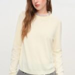 soft knit mock neck top, feminine ruffle trim knitwear for women, long sleeve mock neck knit top, mock neck ribbed knit top for women