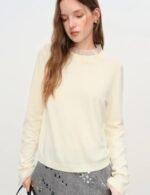 soft knit mock neck top, feminine ruffle trim knitwear for women, long sleeve mock neck knit top, mock neck ribbed knit top for women