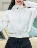 Women wearing winter cropped zip up hoodie
