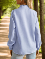 Side view of women's office blouse showing regular fit and full sleeve length