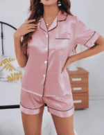 Women's satin pajama set in champagne color, button-down top and shorts